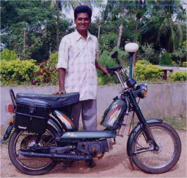Photo of Raju and his bike