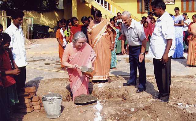 Glenys Hambleton laying an Assembly Hall brick